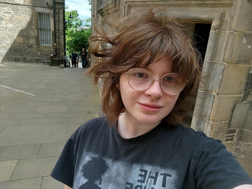 Eve standing outside the Writers' Museum building