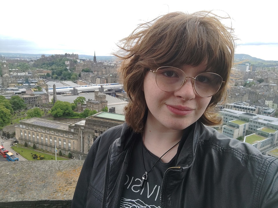 A young person shows the view from the Nelson Monument