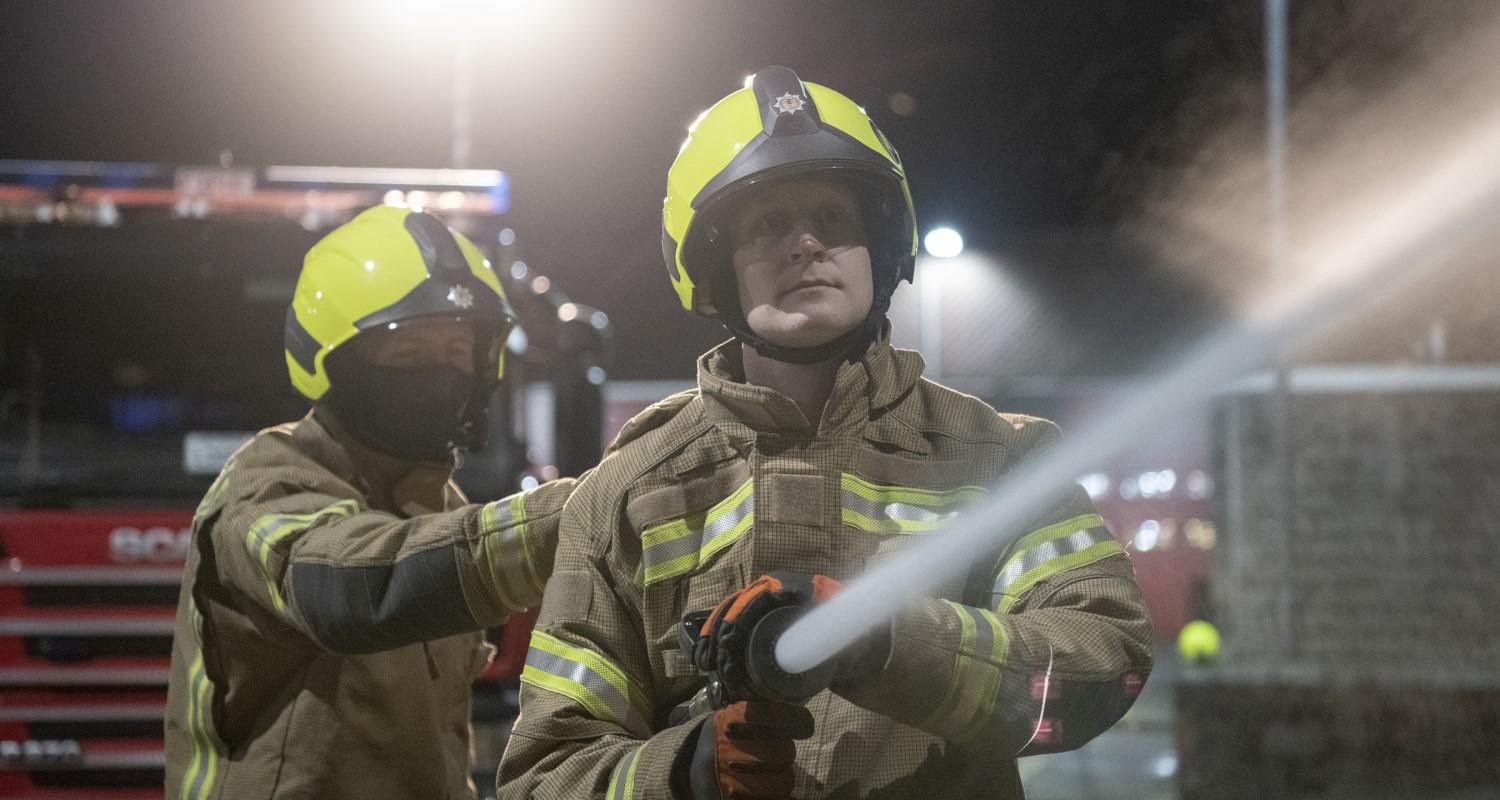 Firefighters on nighttime duty