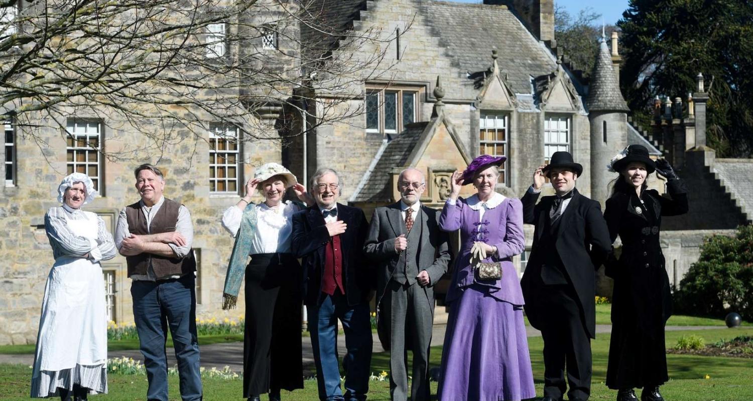 Edinburgh Living History members in costume outside Lauriston Castle.