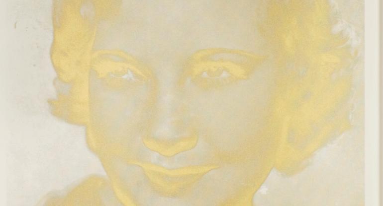 A screen print in golden yellows of a woman facing the viewer