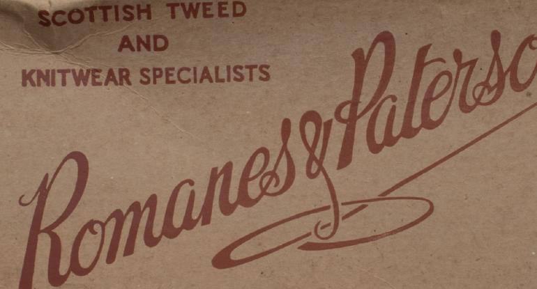 A section of a Romanes & Paterson delivery box with lettering