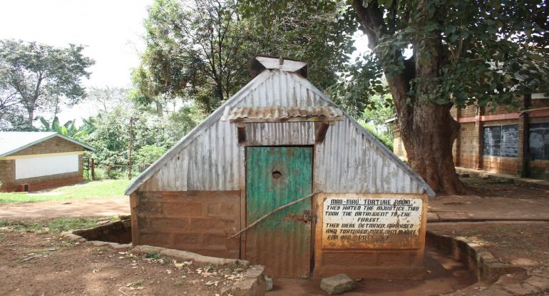 A brick and corrugated metal shed used as a Mau Mau torture room