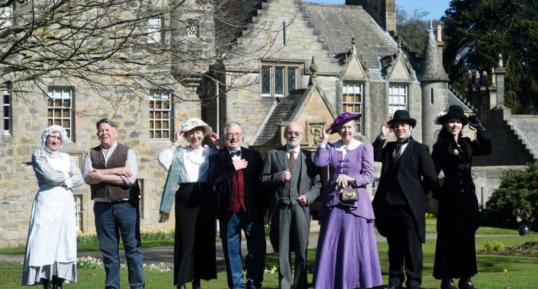 Edinburgh Living History members in costume outside Lauriston Castle.